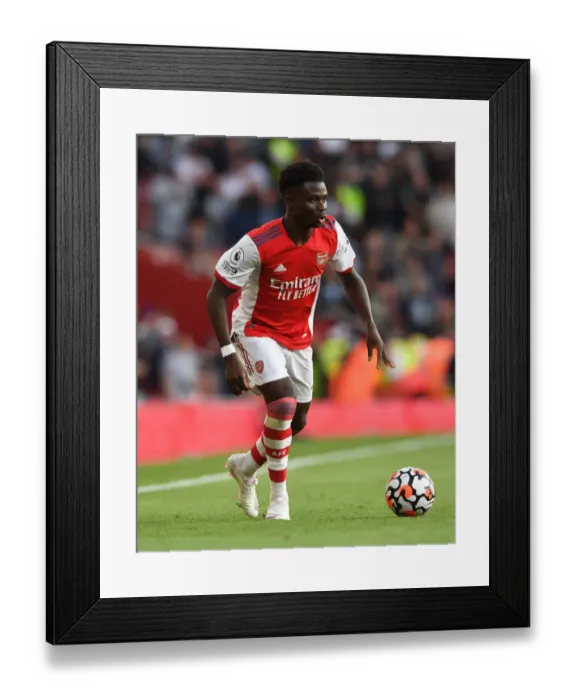 Framed Print : Bukayo Saka: Arsenal Star Shines in Derby Showdown vs. Tottenham Hotspur, 2021-22 Premier League