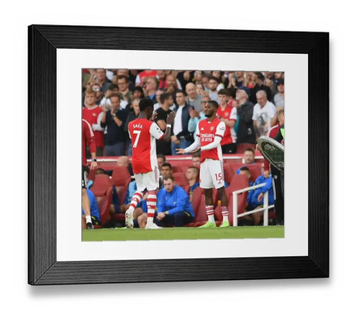 Framed Print : Arsenal: Maitland-Niles and Saka Celebrate Camaraderie Amidst Rivalry - Arsenal vs. Tottenham Hotspur, 2021-22 Premier League