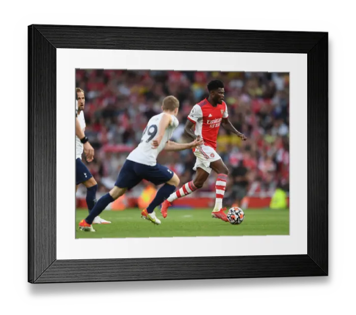 Framed Print : Thomas Partey's Battle: Arsenal vs. Tottenham in the Premier League Framed Print : Thomas Partey's Battle: Arsenal vs. Tottenham in the Premier League