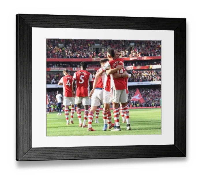 Framed Print : Arsenal's Aubameyang and Xhaka: Celebrating Victory Over Rival Spurs in the 2021-22 Premier League
