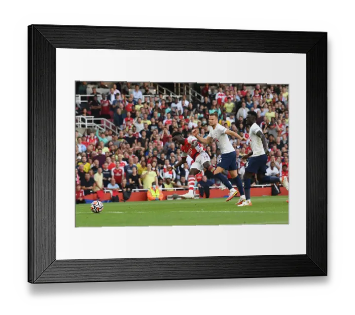 Framed Print : Bukayo Saka Scores the Third Goal: Arsenal vs. Tottenham Hotspur, Premier League 2021-22