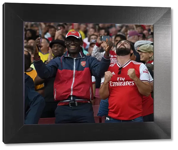 Passionate Arsenal Fans at Emirates Stadium: Arsenal vs. Tottenham, Premier League 2021-22
