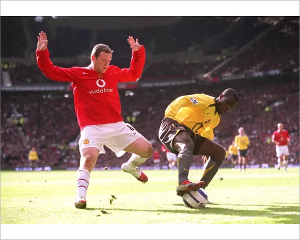 Emmanuel Eboue (Arsenal) Wayne Rooney (Man Utd). Arsenal 0: 2 Manchester United
