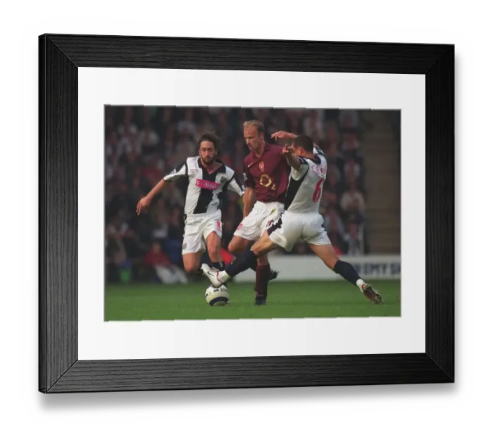 Framed Print : Dennis Bergkamp (Arsenal) Neil Clement (WBA). West Bromwich Albion 2: 1 Arsenal