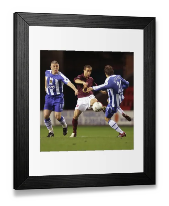 Framed Print : Flamini, Kavanagh, and Bullard: Wigan's Surprise 1-0 Victory Over Arsenal in Carling Cup Semi-Final First Leg Framed Print : Flamini, Kavanagh, and Bullard: Wigan's Surprise 1-0 Victory Over Arsenal in Carling Cup Semi-Final First Leg