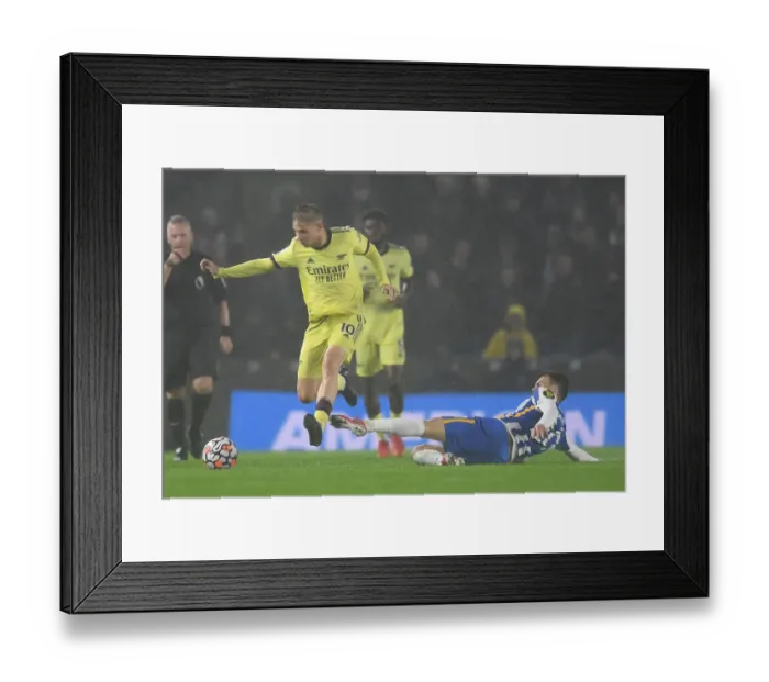 Framed Print : Emile Smith Rowe Leaps Past Solly March: Brighton vs Arsenal, Premier League 2021-22 Framed Print : Emile Smith Rowe Leaps Past Solly March: Brighton vs Arsenal, Premier League 2021-22