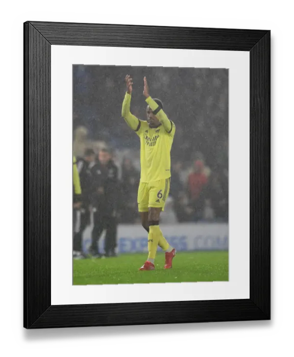 Framed Print : Gabriel Magalhaes Celebrates with Arsenal Fans after Brighton Victory - Premier League 2021-22