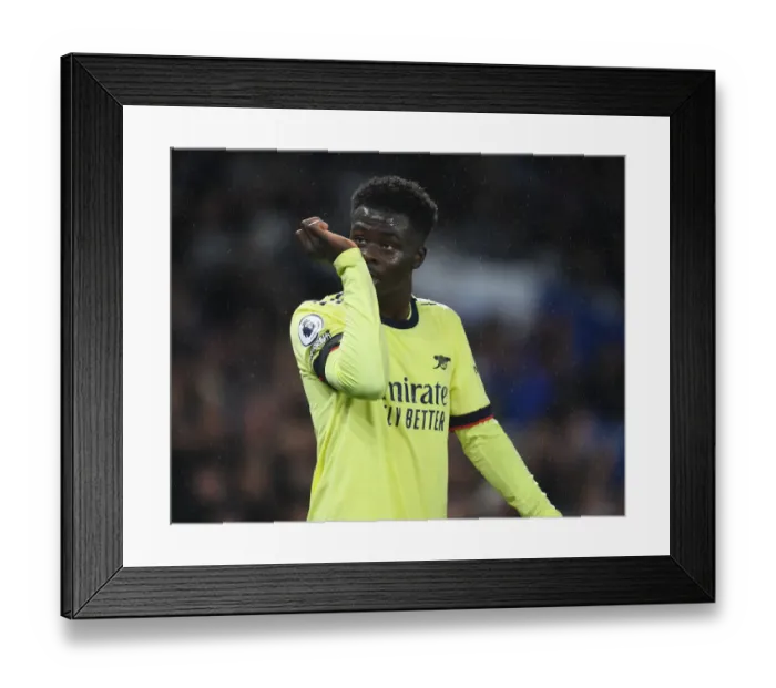 Framed Print : Bukayo Saka's Breakthrough Performance: Arsenal's Triumph over Brighton in the Premier League 2021-22