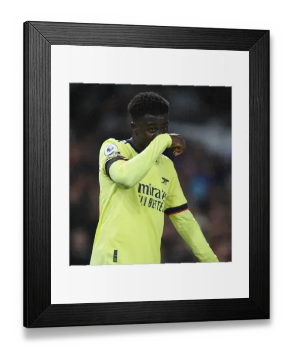 Framed Print : Bukayo Saka's Star Performance: Arsenal Triumphs Over Brighton & Hove Albion, Premier League 2021-22