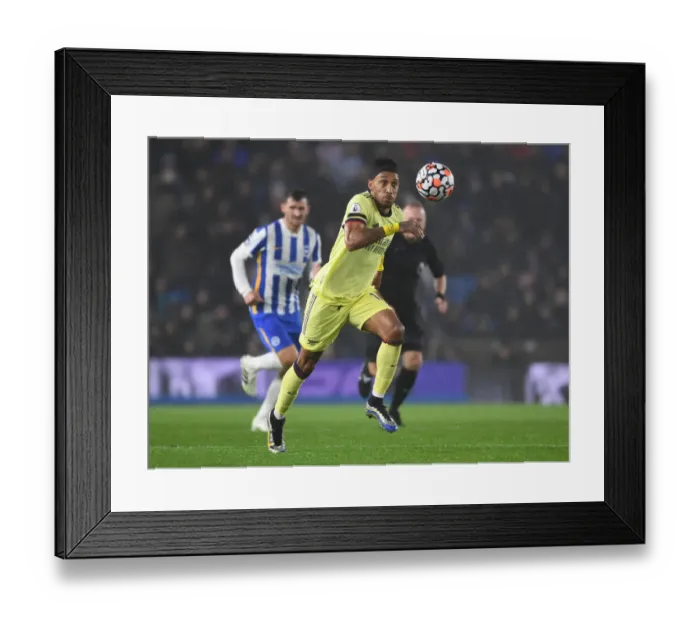 Framed Print : Aubameyang's Brilliance: Arsenal Edge Past Brighton in Premier League Showdown