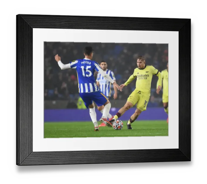 Framed Print : Emile Smith Rowe vs Jakub Moder: Intense Battle in Brighton & Hove Albion vs Arsenal Premier League Clash