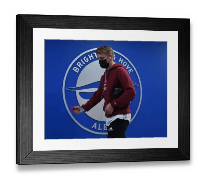 Framed Print : Arsenal's Martin Odegaard Prepares for Premier League Clash Against Brighton & Hove Albion Framed Print : Arsenal's Martin Odegaard Prepares for Premier League Clash Against Brighton & Hove Albion