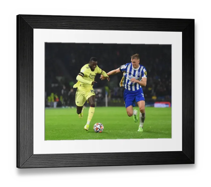 Framed Print : Pepe vs Burn: Battle in the Premier League - Brighton & Hove Albion vs Arsenal (2021-22) Framed Print : Pepe vs Burn: Battle in the Premier League - Brighton & Hove Albion vs Arsenal (2021-22)