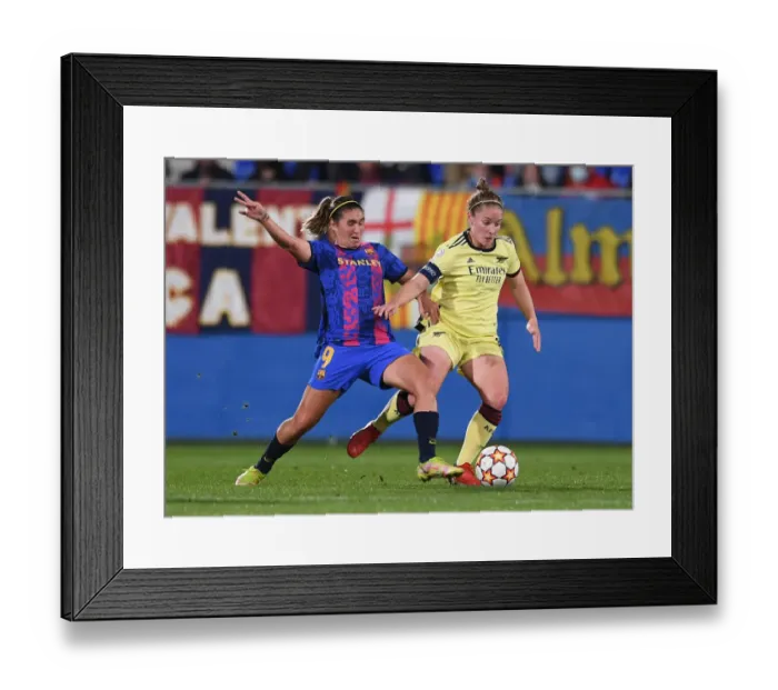 Framed Print : Battle for Supremacy: Kim Little vs Mariona Caldentey in Barcelona's Champions League Clash with Arsenal Women