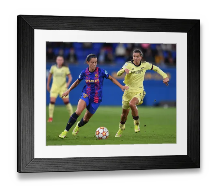 Framed Print : Tobin Heath vs. Aitana Bonmati: Battle in the UEFA Women's Champions League - Barcelona v Arsenal