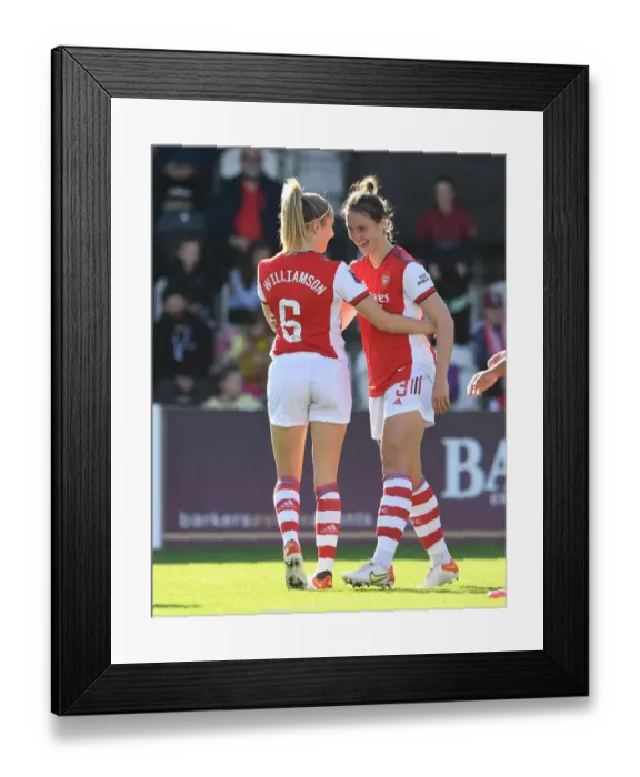 Framed Print : Arsenal Women's Super League Victory: Lotte Wubben-Moy and Leah Williamson Celebrate Goal Against Everton