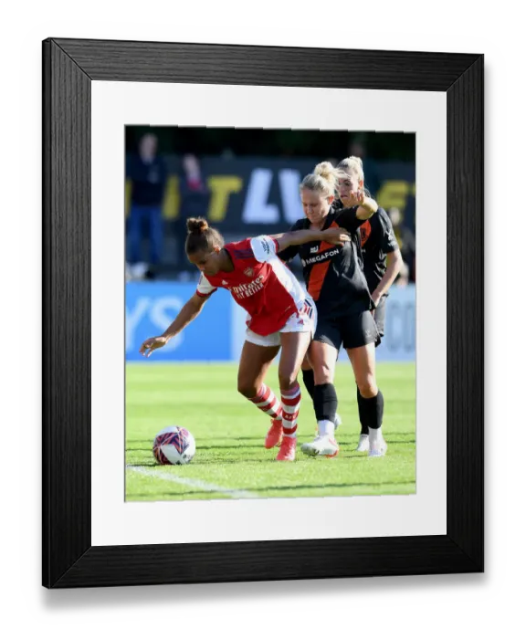 Framed Print : Arsenal vs Everton: Intense Battle in FA WSL Match