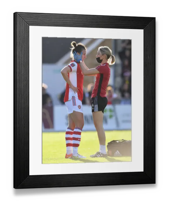 Framed Print : Arsenal's Lotte Wubben-Moy Receives Medical Attention during Arsenal Women vs Everton Women FA WSL Match