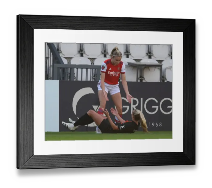 Framed Print : Arsenal Women vs Everton Women: A Battle in the FA WSL - Leah Williamson Consoles Toni Duggan