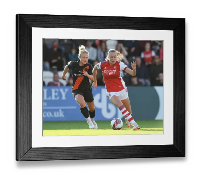 Framed Print : Arsenal vs Everton: FA WSL Showdown - A Clash of Stars: Maanum vs Christiensen