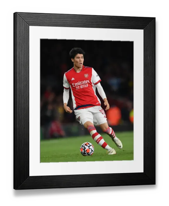 Framed Print : Tomiyasu's Standout Performance: Arsenal Triumphs Over Crystal Palace in Premier League 2021-22