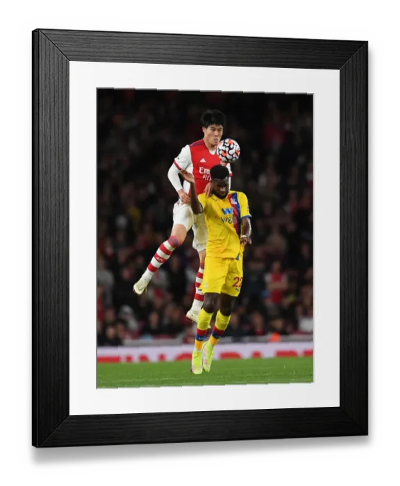 Framed Print : Intense Rivalry: Tomiyasu vs. Edouard Battle in Arsenal vs. Crystal Palace Premier League Clash (2021-22) Framed Print : Intense Rivalry: Tomiyasu vs. Edouard Battle in Arsenal vs. Crystal Palace Premier League Clash (2021-22)