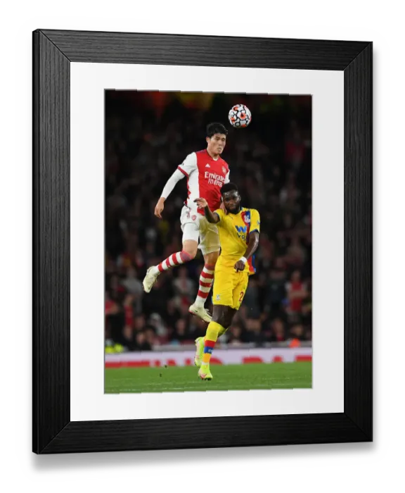 Framed Print : Arsenal vs Crystal Palace: Intense Battle between Tomiyasu and Edouard in the Premier League Framed Print : Arsenal vs Crystal Palace: Intense Battle between Tomiyasu and Edouard in the Premier League