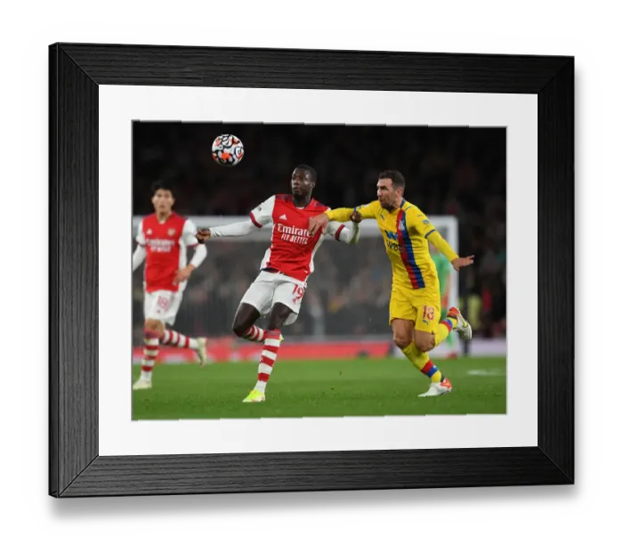 Framed Print : Arsenal's Pepe Faces Off Against Palace's McArthur in Intense Premier League Clash Framed Print : Arsenal's Pepe Faces Off Against Palace's McArthur in Intense Premier League Clash