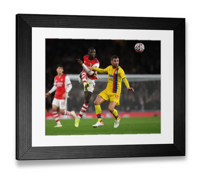 Framed Print : Arsenal vs Crystal Palace: Pepe Under Pressure in Premier League Clash