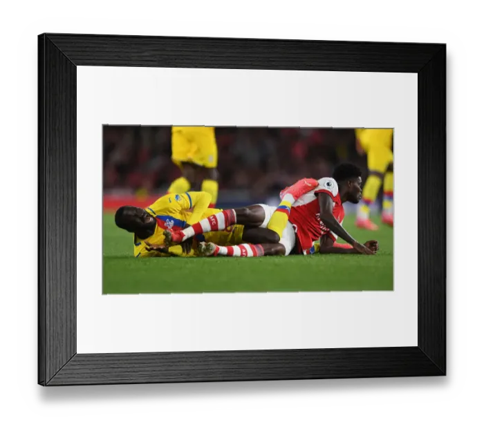 Framed Print : Arsenal vs. Crystal Palace: Thomas Partey and Cheikhou Kouyate Clash in Premier League Showdown