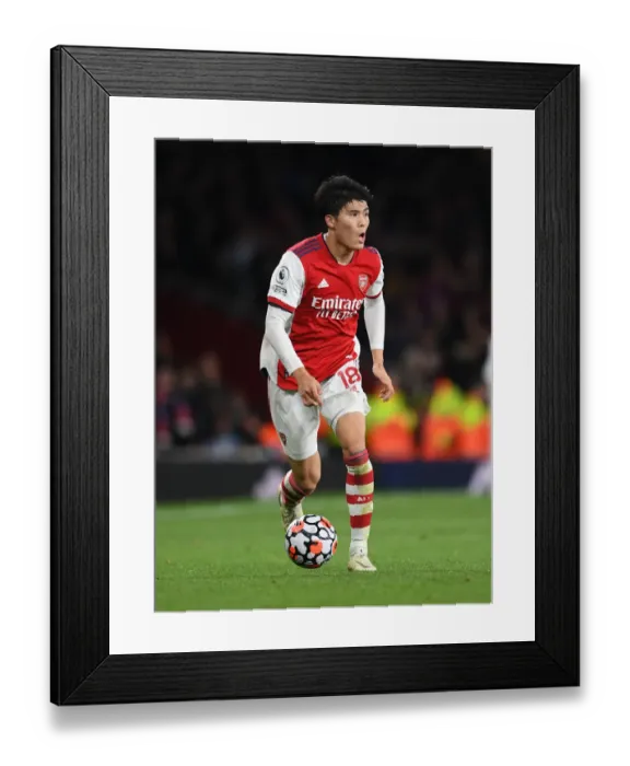 Framed Print : Arsenal's Tomiyasu in Action: Premier League 2021-22 - Arsenal vs. Crystal Palace