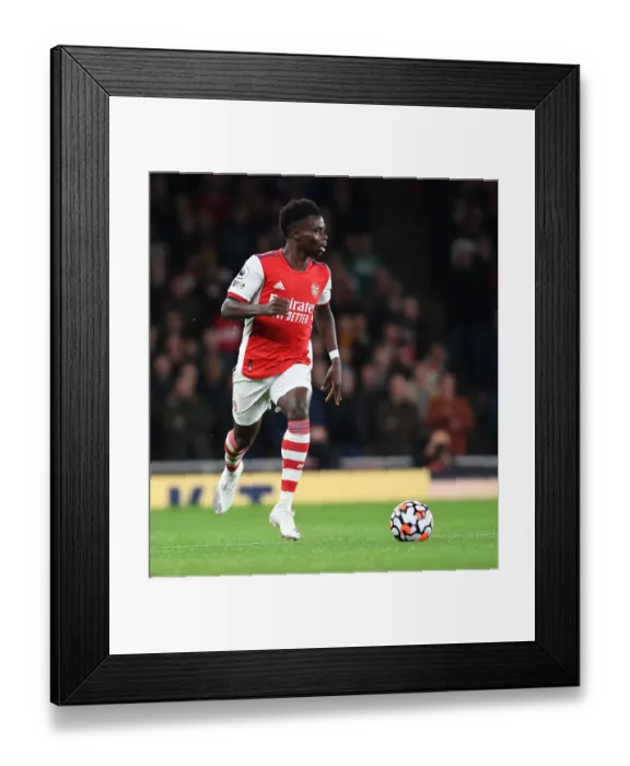 Framed Print : Arsenal's Bukayo Saka in Action: Premier League Showdown vs. Aston Villa, 2021-22