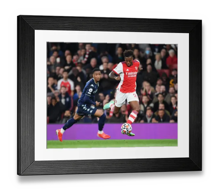 Framed Print : Arsenal's Nuno Tavares in Action Against Aston Villa in the Premier League Framed Print : Arsenal's Nuno Tavares in Action Against Aston Villa in the Premier League