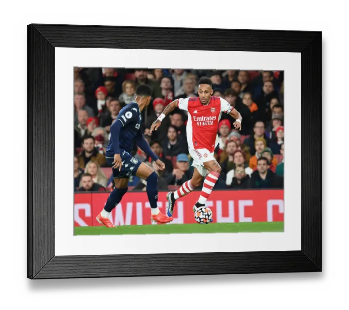 Framed Print : Arsenal's Abameyang Clashes with Aston Villa's Luis in Premier League Showdown