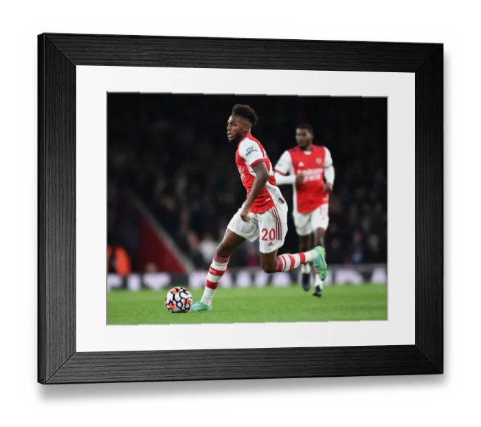 Framed Print : Arsenal's Nuno Tavares in Action Against Aston Villa - Premier League 2021-22