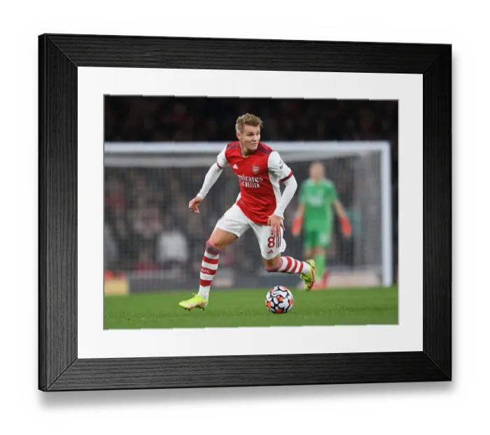 Framed Print : Arsenal's Martin Odegaard Shines in Arsenal v Aston Villa Premier League Clash (2021-22) Framed Print : Arsenal's Martin Odegaard Shines in Arsenal v Aston Villa Premier League Clash (2021-22)