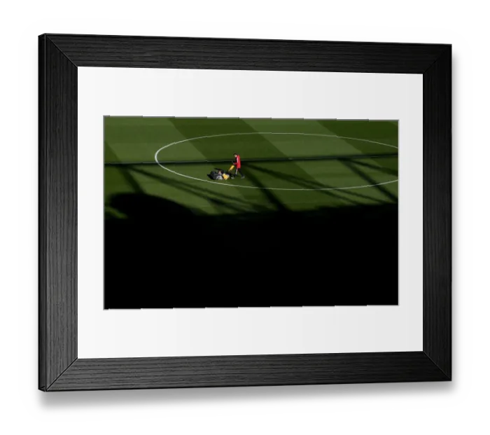 Framed Print : Arsenal: Battle Ready - Pre-Match Groundskeeping at Emirates Stadium