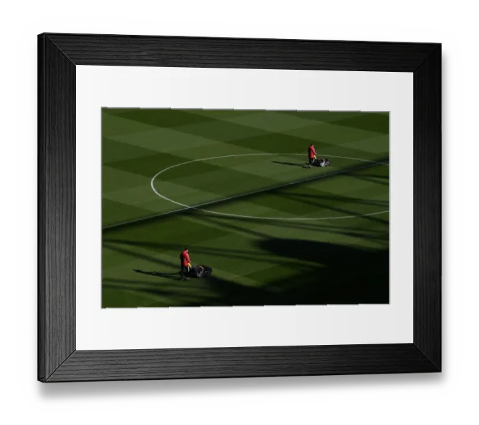 Framed Print : Arsenal: Gameday Preparation - The Emirates Stadium Groundsmen at Work (2021-22) (Arsenal vs Aston Villa)