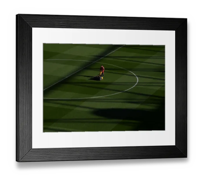 Framed Print : Arsenal: Battle Ready - Pre-Match Groundskeepers at Emirates Stadium