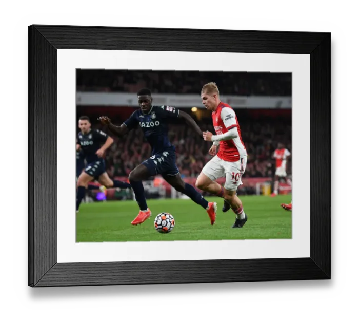 Framed Print : Arsenal's Emile Smith Rowe Clashes with Aston Villa's Axel Tuanzebe in Premier League Showdown Framed Print : Arsenal's Emile Smith Rowe Clashes with Aston Villa's Axel Tuanzebe in Premier League Showdown