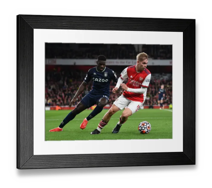 Framed Print : Emile Smith Rowe vs. Axel Tuanzebe: Intense Face-Off in Arsenal vs. Aston Villa Premier League Clash