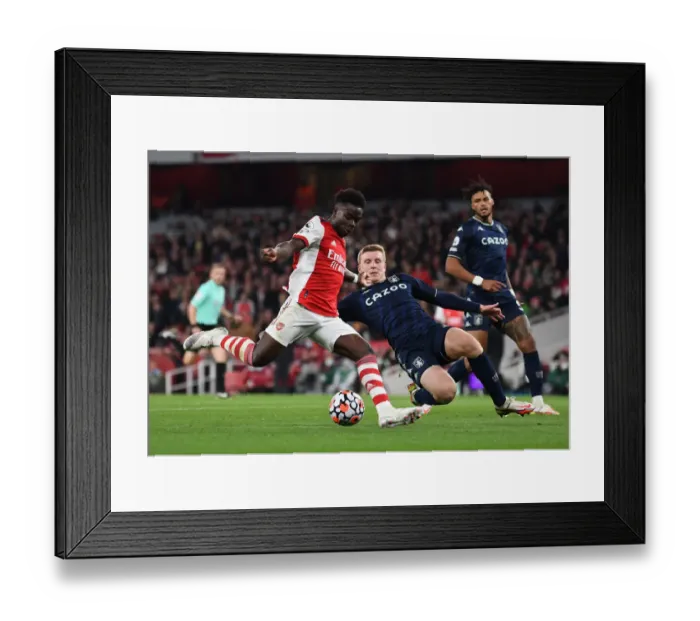 Framed Print : Arsenal vs Aston Villa: Bukayo Saka vs Matt Targett Battle at Emirates Stadium Framed Print : Arsenal vs Aston Villa: Bukayo Saka vs Matt Targett Battle at Emirates Stadium