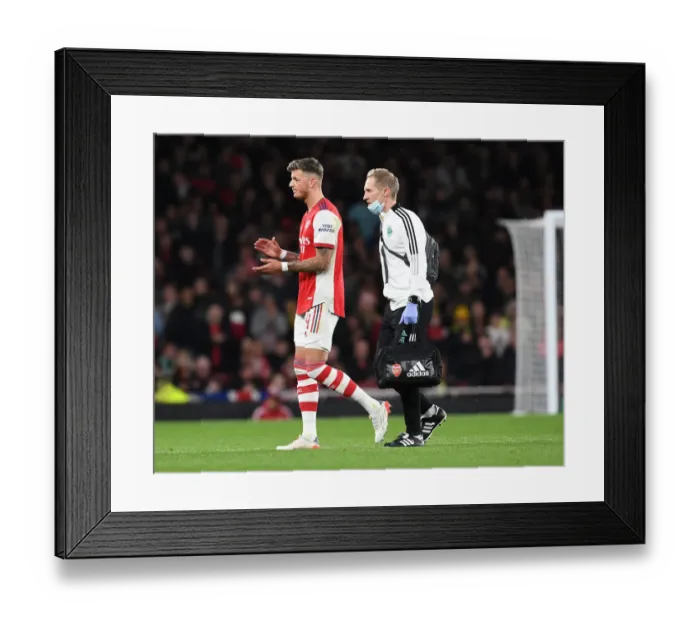 Framed Print : Arsenal's Jordan Reece Attends to Ben White's Injury During Arsenal vs Leeds United (Carabao Cup 2021-22) Framed Print : Arsenal's Jordan Reece Attends to Ben White's Injury During Arsenal vs Leeds United (Carabao Cup 2021-22)