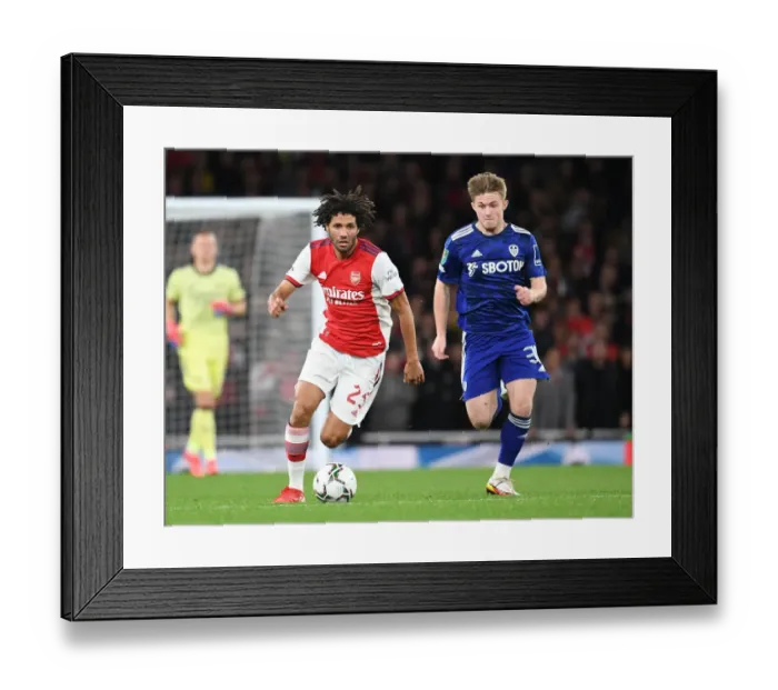 Framed Print : Mo Elneny Outsmarts Joe Gelhardt: Arsenal's Midfield Maestro Dazzles in Carabao Cup Clash Framed Print : Mo Elneny Outsmarts Joe Gelhardt: Arsenal's Midfield Maestro Dazzles in Carabao Cup Clash