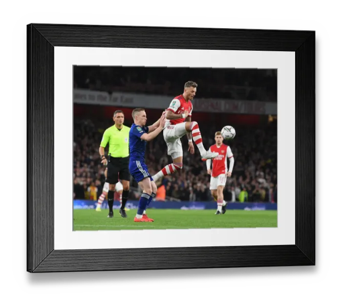 Framed Print : White's Unyielding Defense: Arsenal vs Leeds United in Carabao Cup Battle
