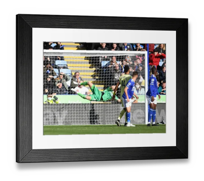 Framed Print : Arsenal's Ramsdale Stands Firm: Saving Maddison's Free Kick vs Leicester City, Premier League 2021-22