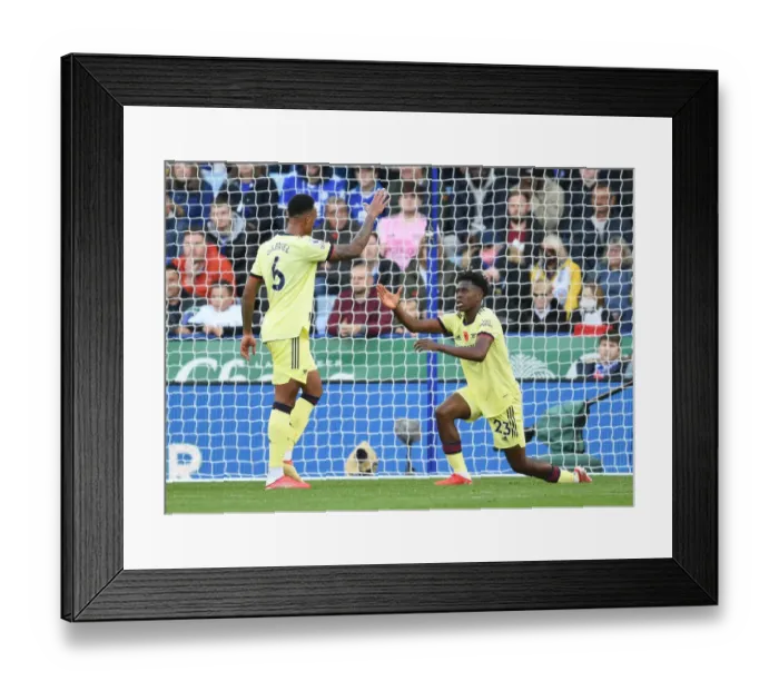 Framed Print : Arsenal's Gabriel and Sambi Face Off Against Leicester City in Premier League Clash