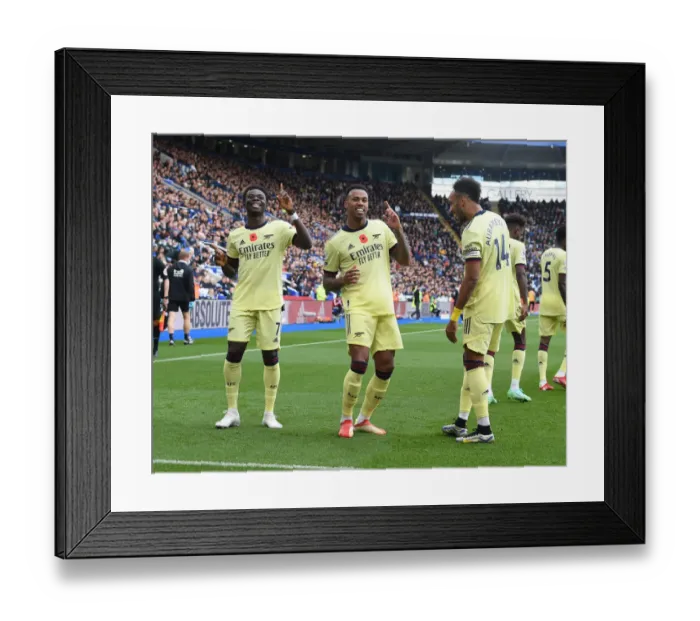 Framed Print : Arsenal's Gabriel, Saka, and Aubameyang: Celebrating Their First Goal Together Against Leicester City (2021-22)