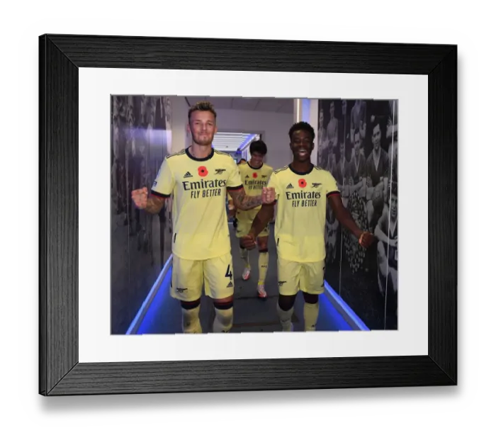 Framed Print : Arsenal's White and Saka Celebrate Victory Over Leicester City in 2021-22 Premier League