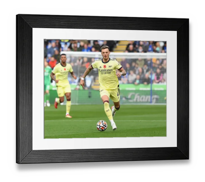 Framed Print : Arsenal's Ben White Stands Firm Against Leicester City in Premier League Clash